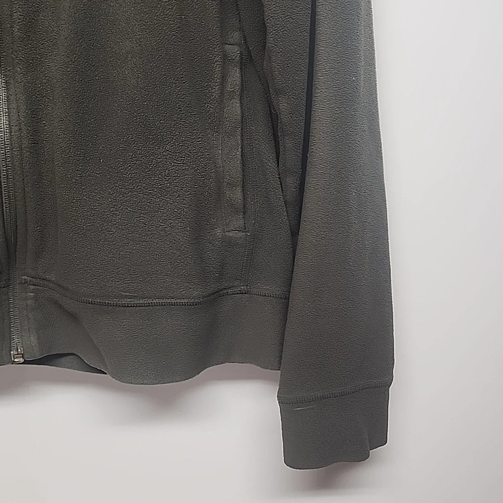 The North Face olive green embroidered  long sleeve hooded sweatshirt.
